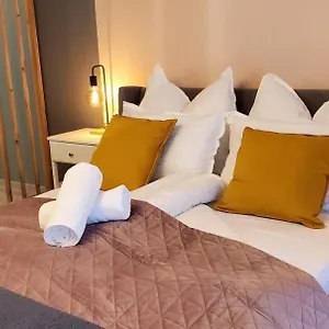 rezervați aici